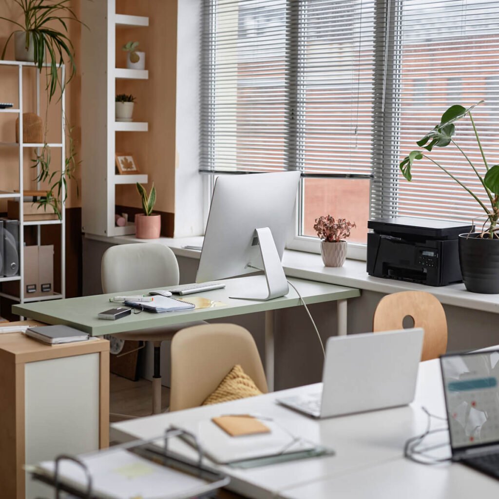 Championing female health in the workplace Office Interior With Plants And Coral Pink Wall 2024 06 15 02 36 36 Utc 1024x1024