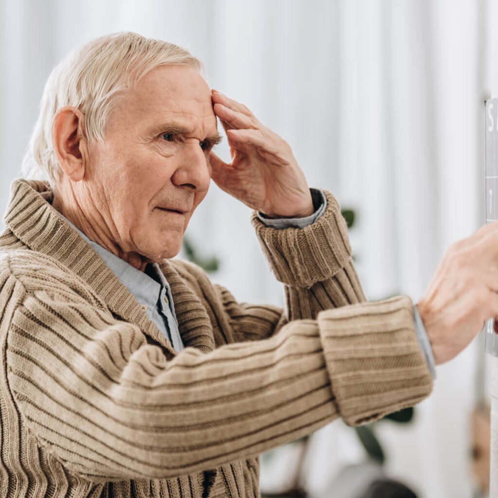 Senior Man Looking At Wall Calendar And Touching H 2023 11 27 05 11 38 Utc 1024x1024
