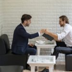 young businessman talking work with colleague in a 67AKYW2 Hotel Paradise DLX