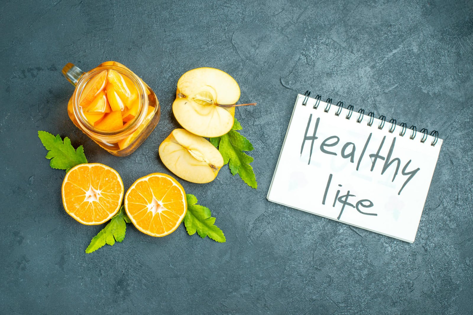 Top View Cocktail Cut Oranges And Apples On Dark I 2023 11 27 05 27 33 Utc 1 1