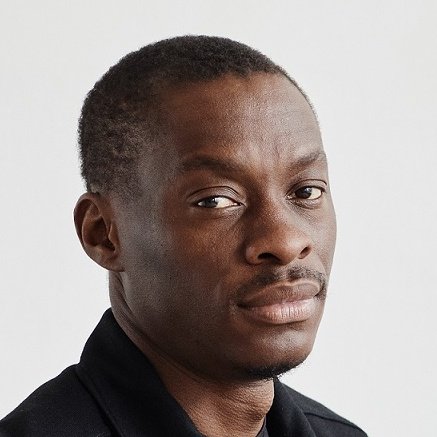 black entrepreneur at desk minimal 2021 12 09 15 21 25 utc Cropped Hotel Paradise DLX